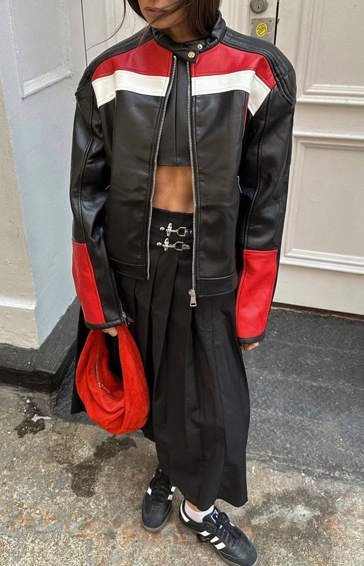 Front view of a black biker jacket, zipped up, with red and white panels on the shoulders and sleeves