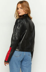 Rear-side view of a black biker jacket with quilted shoulder panels, ribbed back, and a red stripe on the left sleeve
