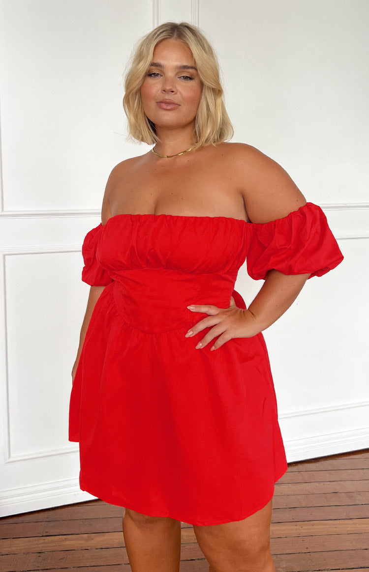 Red off-the-shoulder mini dress with a ruched neckline, short puffed sleeves, and a fitted bodice