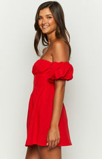Side view of a red off-the-shoulder mini dress with puffed sleeves and a fitted waist
