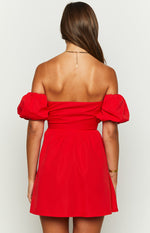 Rear view of a red off-the-shoulder mini dress with puff sleeves and a fitted waist