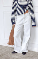 Beginning Boutique Lovers Lane White Denim Heart Pocket Slouchy Jeans white denim slouchy wide-leg jeans with heart-shaped ba
