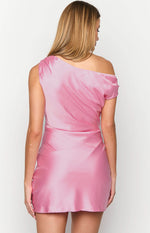 Rear view of a pink satin mini dress with a draped one-shoulder neckline and fitted silhouette