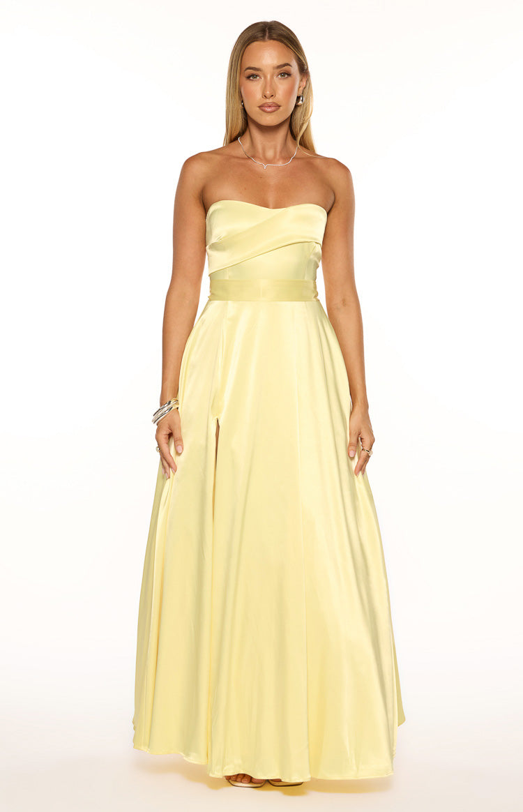 Yellow satin strapless maxi dress with a ruched bust, wide waistband, and a high leg split