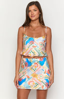 Beginning Boutique Milliana Dolce Print Mini Skirt white satin mini skirt with a vibrant Dolce print