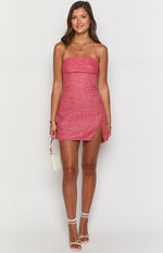 Red tweed strapless mini dress with a fitted silhouette and a thigh-high side slit