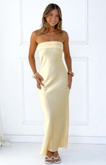 Front view of a yellow strapless maxi dress with a banded top and a smooth flowing skirt