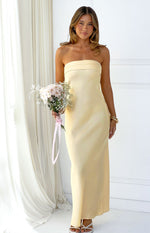 Front view of a yellow strapless maxi dress with a banded neckline and a straight, fitted silhouette