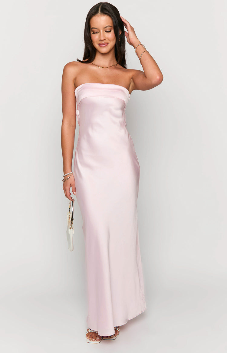 Front view of a light pink strapless satin maxi dress with a folded bust and flowing skirt