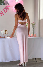 Rear view of a light pink satin maxi dress with a back cutout, elasticated band, and cowl drape