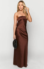 Front view of a brown satin strapless maxi dress with a folded bust detail and side tie