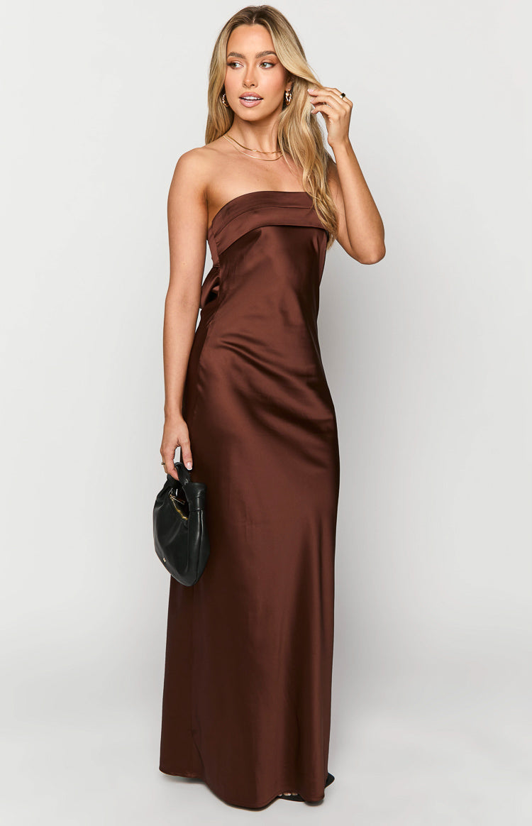 Front view of a brown satin strapless maxi dress with a folded bust detail and side tie