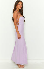 Side view of a lilac maxi dress with a ribbed bodice, square neckline, thin spaghetti straps, and lace-up side detail