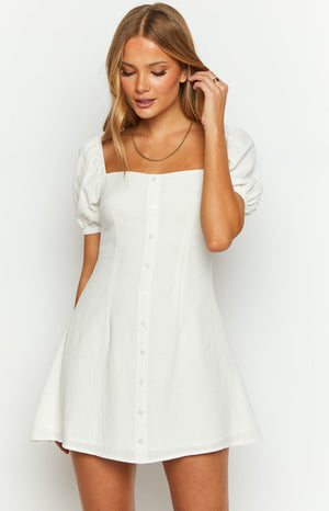 Beginning Boutique Maysen White Cap Sleeve Mini Dress white textured square neck mini dress with puffed cap sleeves and button front