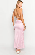 Rear view showing the low scoop back with thin spaghetti straps and two horizontal back straps on a pink satin maxi dress