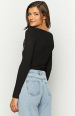 Side view of a black ribbed long sleeve bodysuit with a square neckline