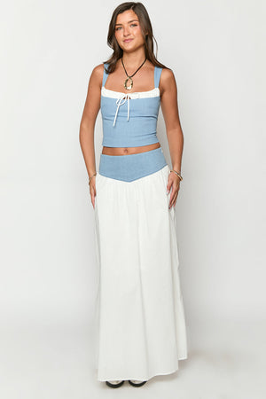 Beginning Boutique Mystic White Maxi Skirt white maxi skirt with a light blue V-shaped waistband and flowy A-line silhouette