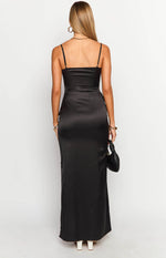 Rear view of a black satin maxi dress with thin spaghetti straps and a straight back neckline