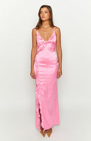 Front view of a pink satin maxi dress with a V-neck, spaghetti straps, cascading ruffles, and a high side slit