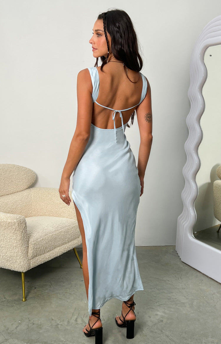 Rear view of the ocean blue satin midi dress with a low scoop back, delicate tie detail, and a high leg slit