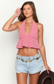 Red gingham crop top with a deep V-neck halter and gathered peplum hem