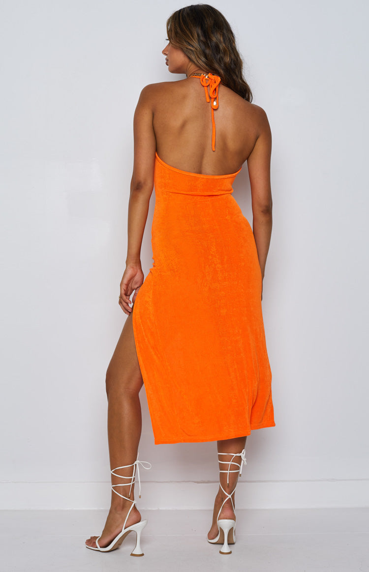 Close-up of the orange textured knit fabric and a rounded cutout detail