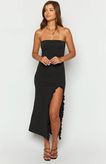 Front view of a black strapless maxi dress with a high thigh split and ruffled trim