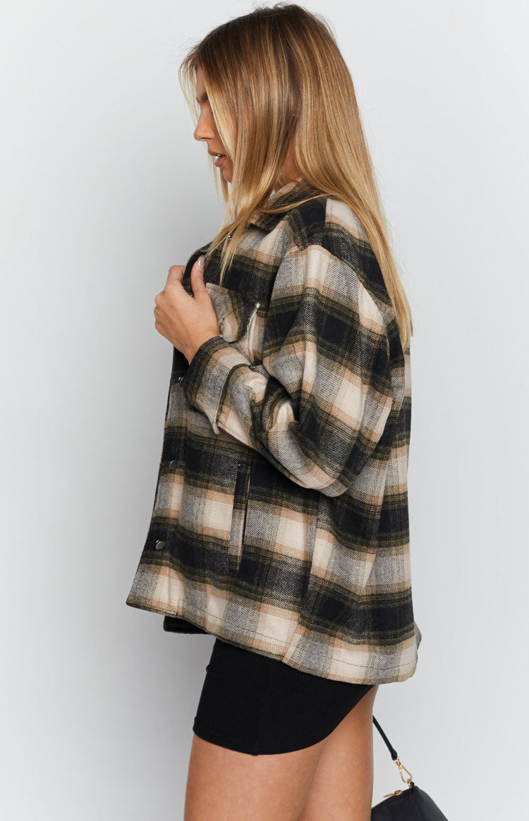 Relaxed fit black, beige, and brown check fleece jacket with two buttoned chest pockets