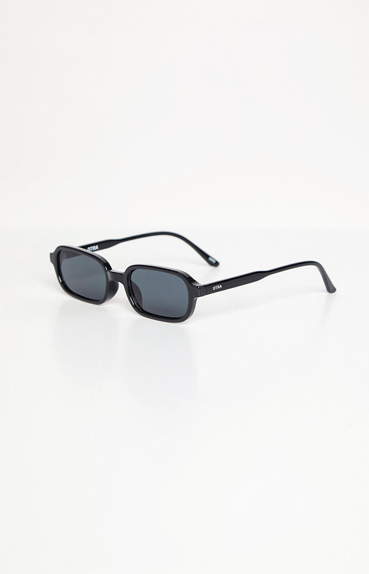 Front view of black rectangle sunglasses with dark lenses and arms slightly open