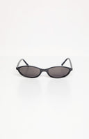 brunette model wearing black cateye frames sunglasses with smokey black lenses