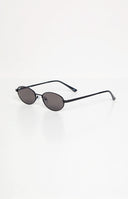 Beginning Boutique Otra Eyewear Rosie Black Oval Sunglasses black oval sunglasses with thin frames and dark lenses