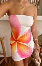 Front close-up of the white strapless mini dress with a large pink and orange frangipani floral print
