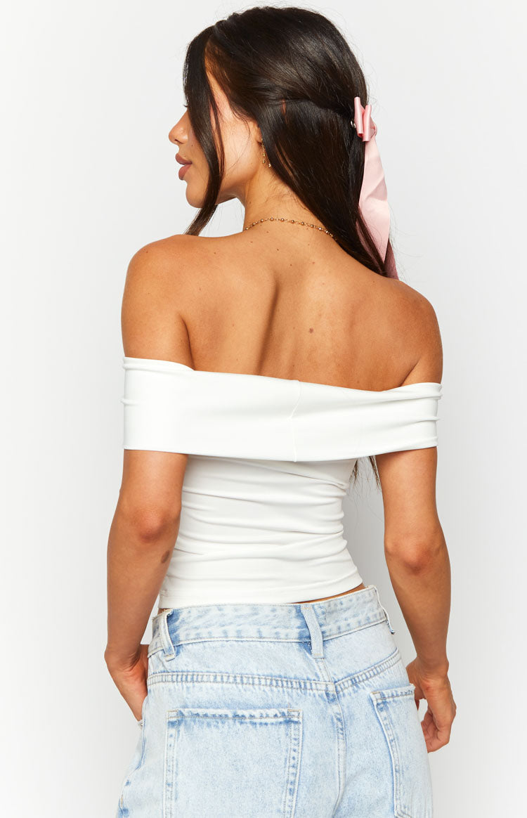 Rear view of a white off-shoulder cropped top with a fitted bodice and subtle ruching