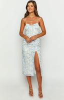 Beginning Boutique Paloma Blue Floral Midi Dress light blue floral midi dress with ruched tie-front bust, spaghetti straps, and thigh split