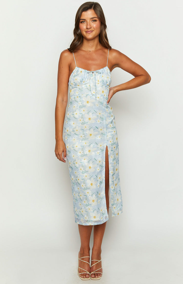 Front view of a light blue floral midi dress with a bodycon fit and high thigh split