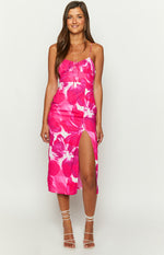 Front view of a pink and white floral print midi dress with a tie-front bust and high side slit