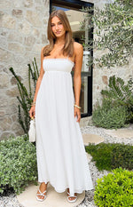 Front view of a white satin maxi dress featuring delicate lace trim along the bust and a flowing empire waist skirt