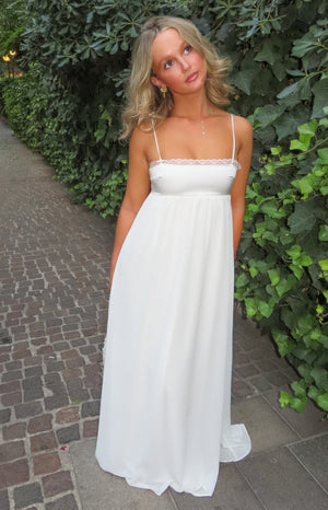 Beginning Boutique Patsy White Satin Maxi Dress white satin straight neckline with lace trim spaghetti straps empire waist fl