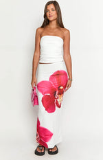 Smooth white fitted maxi skirt with a large vibrant pink orchid floral print