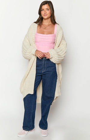 Longline cream chunky knit cardigan with an open front and relaxed oversized fit