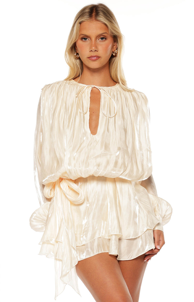 Pearl iridescent satin mini dress with long puff sleeves, V-neck tie collar, and a tie waist