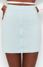 Soft blue knit skirt with a ribbed waistband and a full-length button-front detail