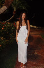 White strapless top with a gathered front and multiple tiers of ruffles