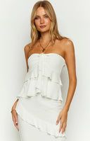 Beginning Boutique Raleigh White Ruffle Strapless Top white strapless top with tiered ruffles and a fitted bodice