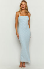 Light blue maxi dress with white floral lace pattern, square neckline, and delicate lace trim at the hem