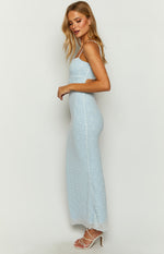 Side view of a light blue lace maxi dress with waist cutouts and a side slit