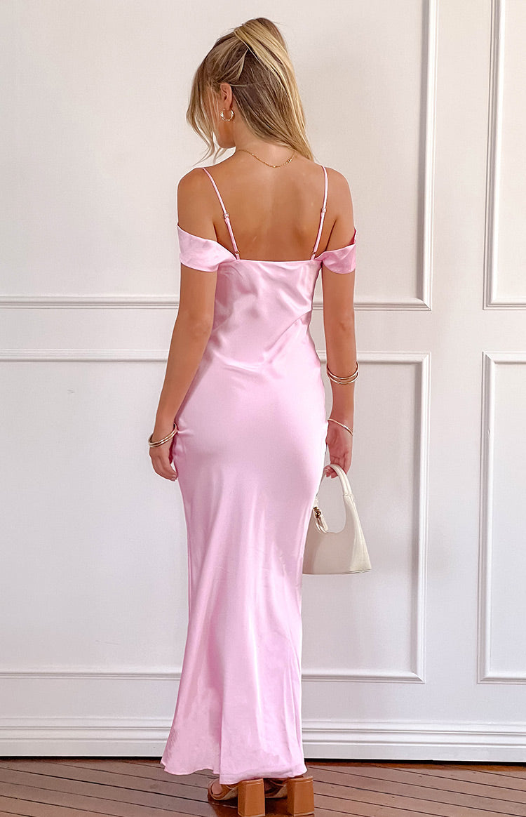 Rear view of a pink satin maxi dress with off-shoulder sleeves and thin spaghetti straps