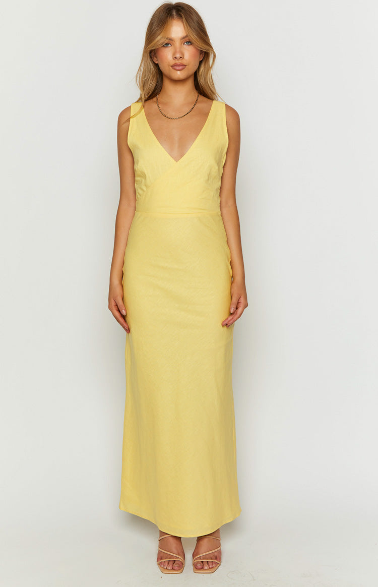 Yellow linen blend maxi dress with a V-neckline, sleeveless design, and a subtle textured finish