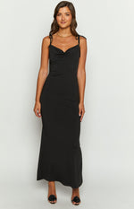 Black fitted maxi dress with a draped cowl neckline and adjustable tie spaghetti straps