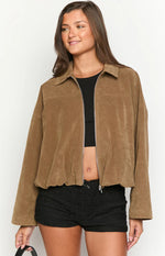 Front view of a brown suedette bomber jacket with a wide collar, long sleeves, and a gathered bubble hem